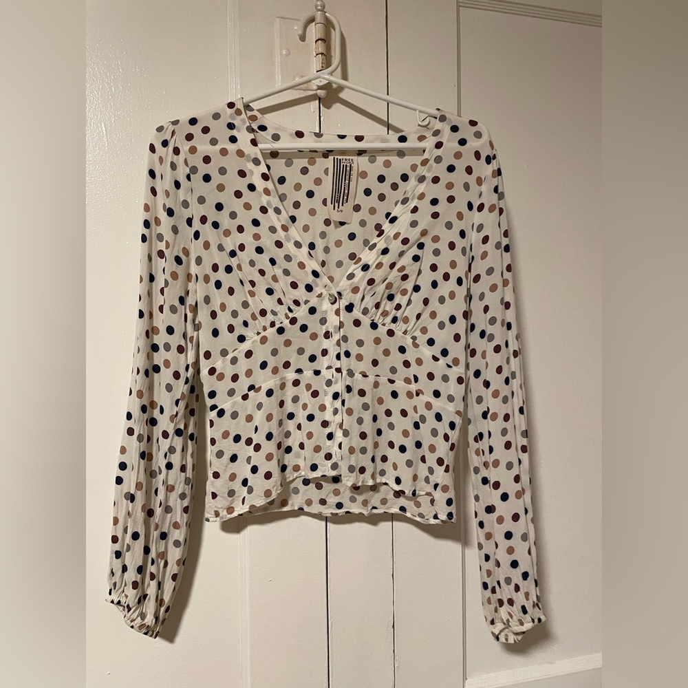 FREE PEOPLE: polka dot button up vneck top